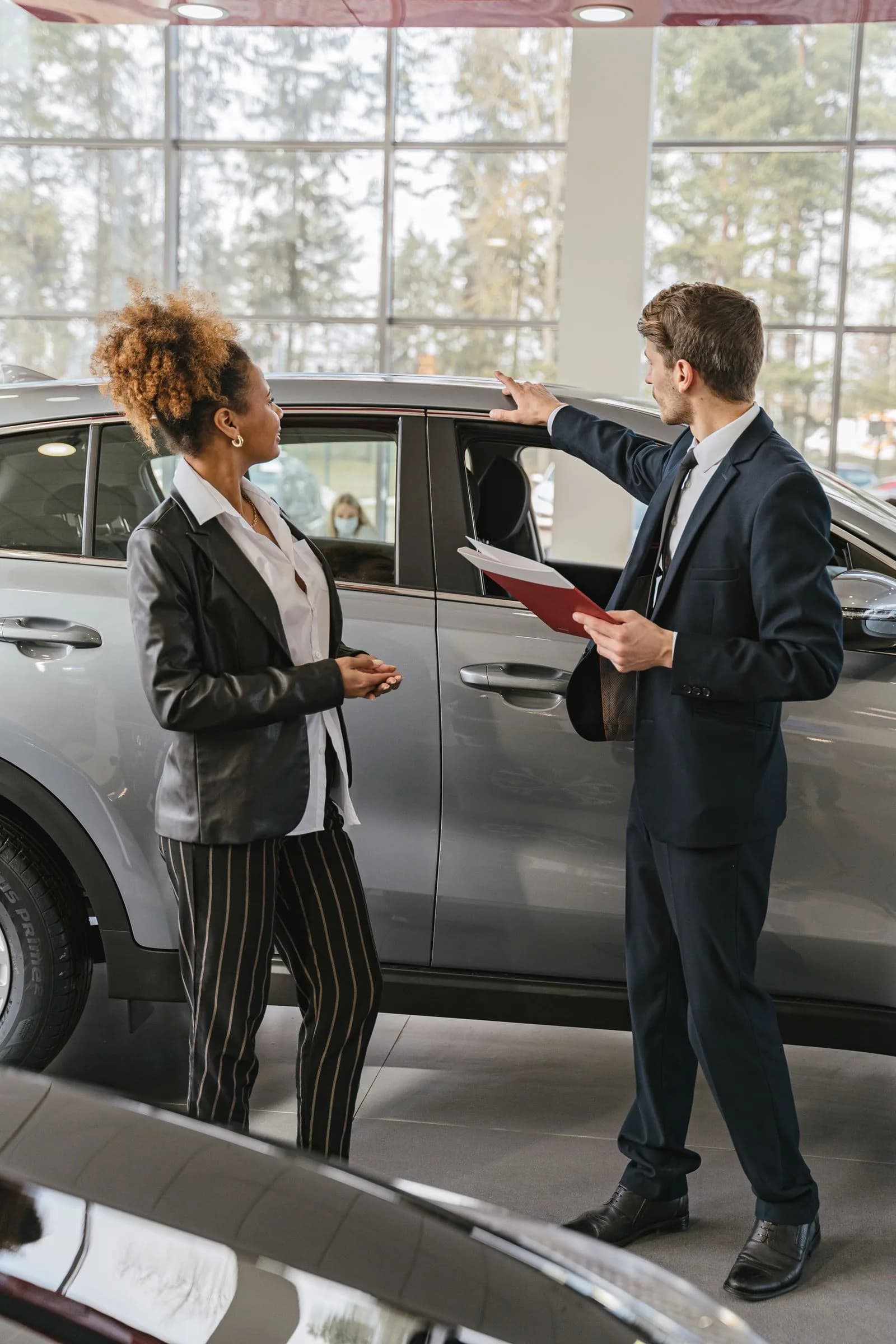 Salesperson customer test drive — Automotive marketing by TML Agency