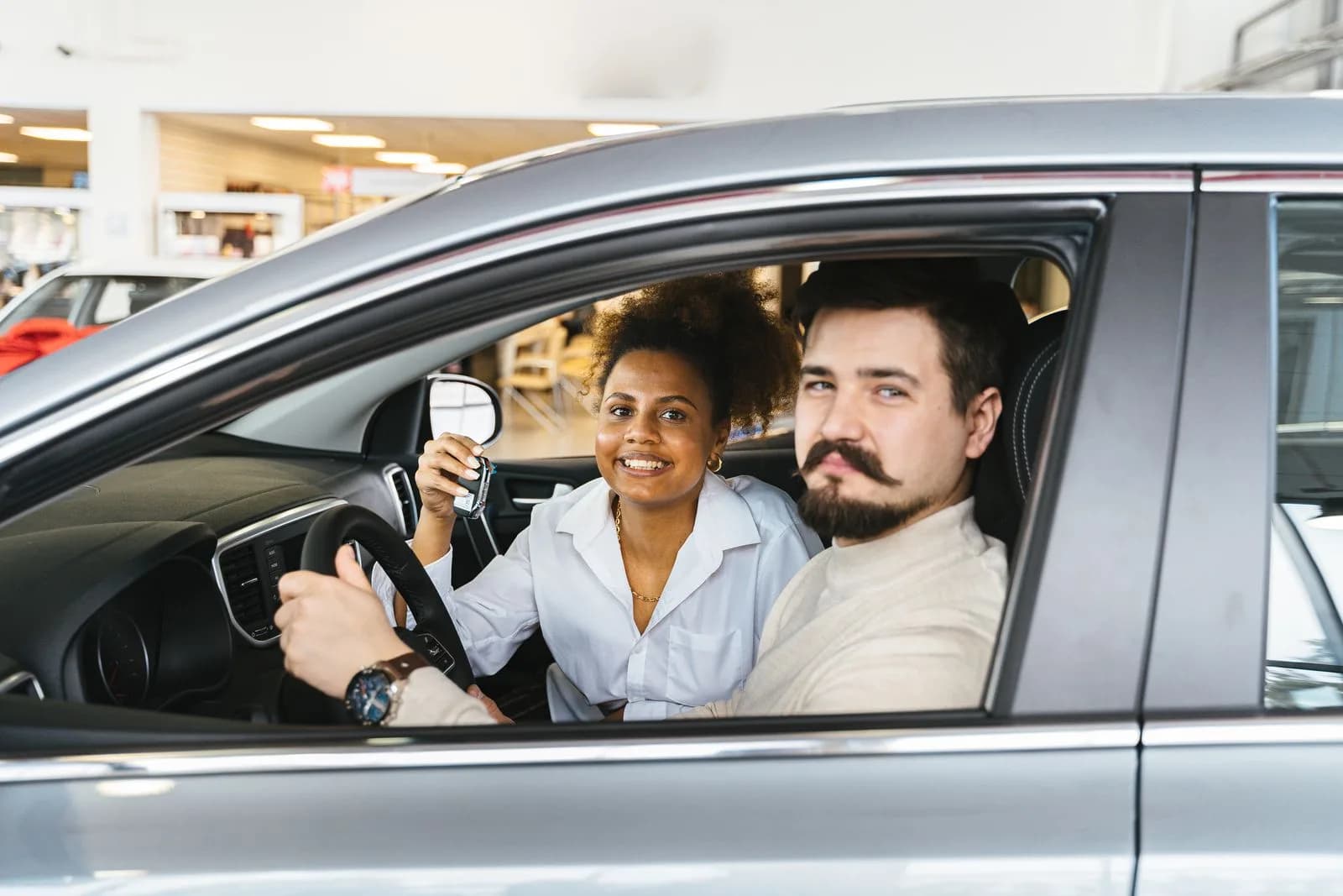 Customer test driving car — Car Dealerships & Auto Dealers marketing by TML Agency