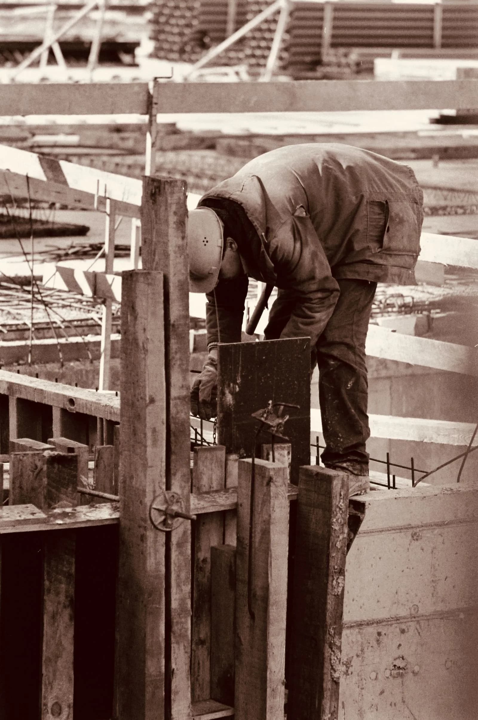 Workers building patio — Landscaping Companies marketing by TML Agency