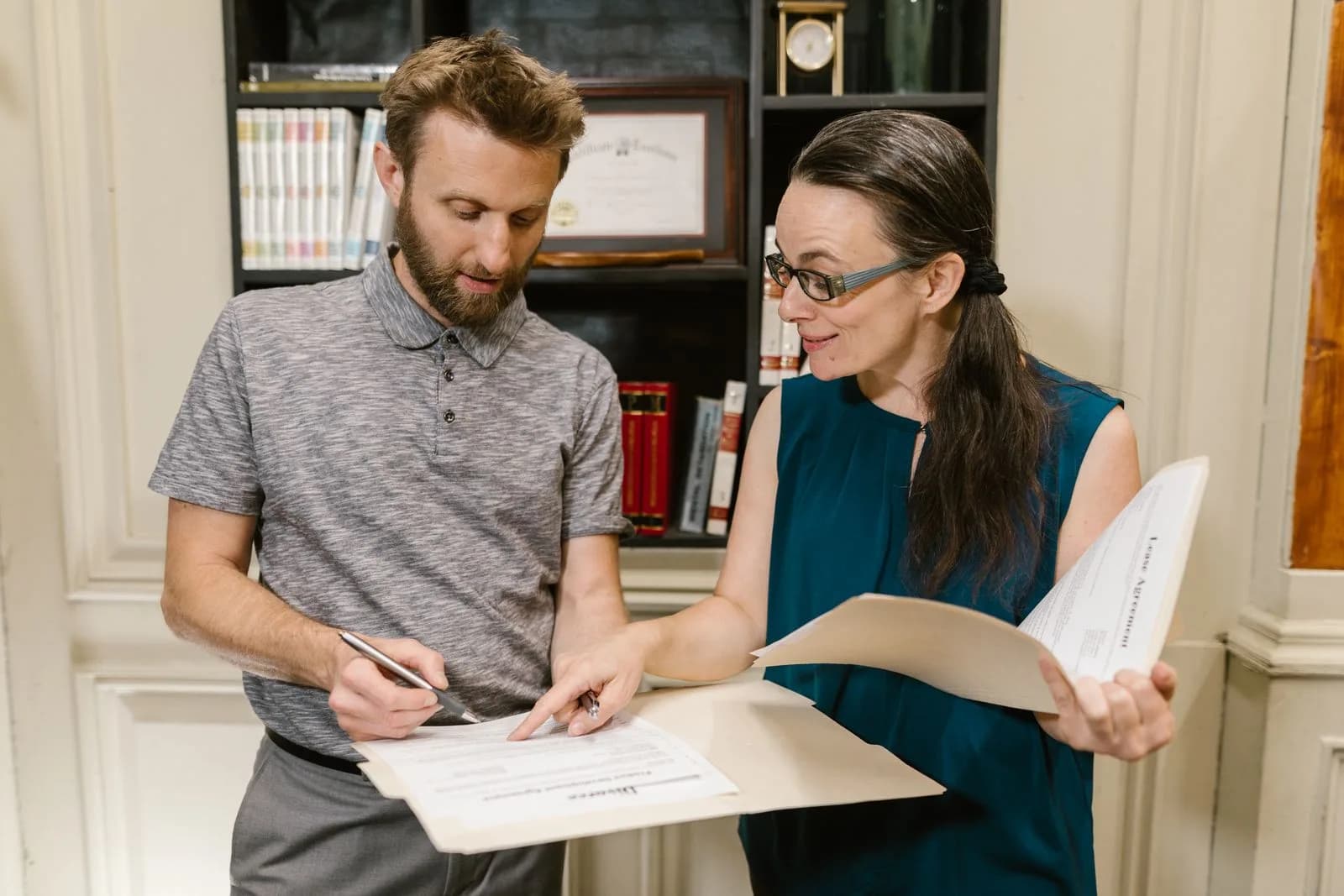 Lawyer reviewing client documents — Law Firms & Legal Services marketing by TML Agency