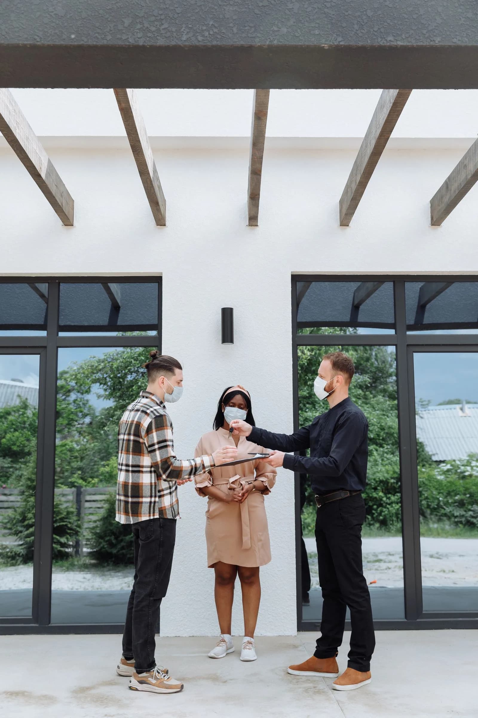Clients receiving their new keys — Real Estate marketing by TML Agency